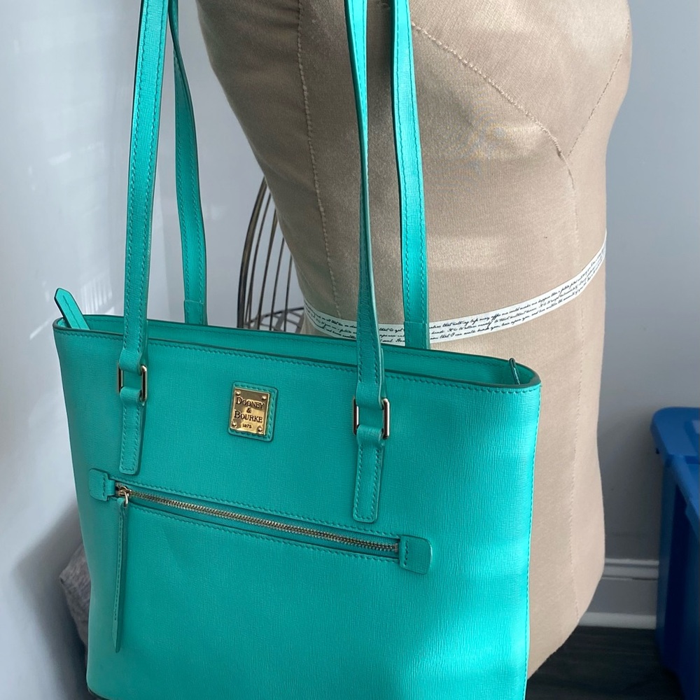 Adorable Like new pale turquoise blue Dooney & Burke.